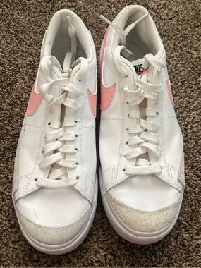 Nike Women’s White Leather Sneakers with Pink Swoosh Accents